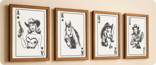 Four framed playing card illustrations on a wall, featuring black-and-white drawings of a cowgirl with a gun, a horse, a queen figure, and another cowgirl in vintage style.